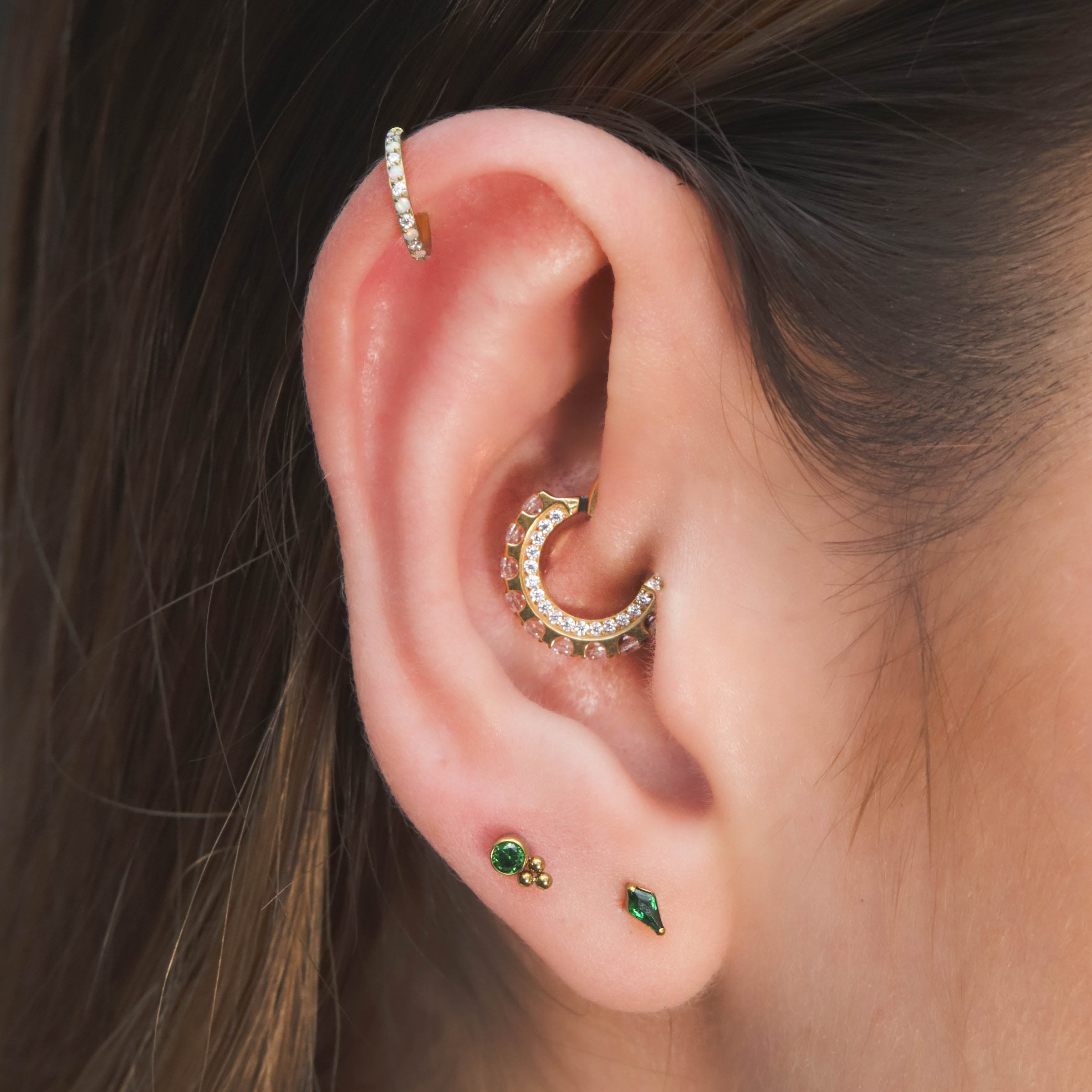Green Essence · Piercings en Titanio y Oro