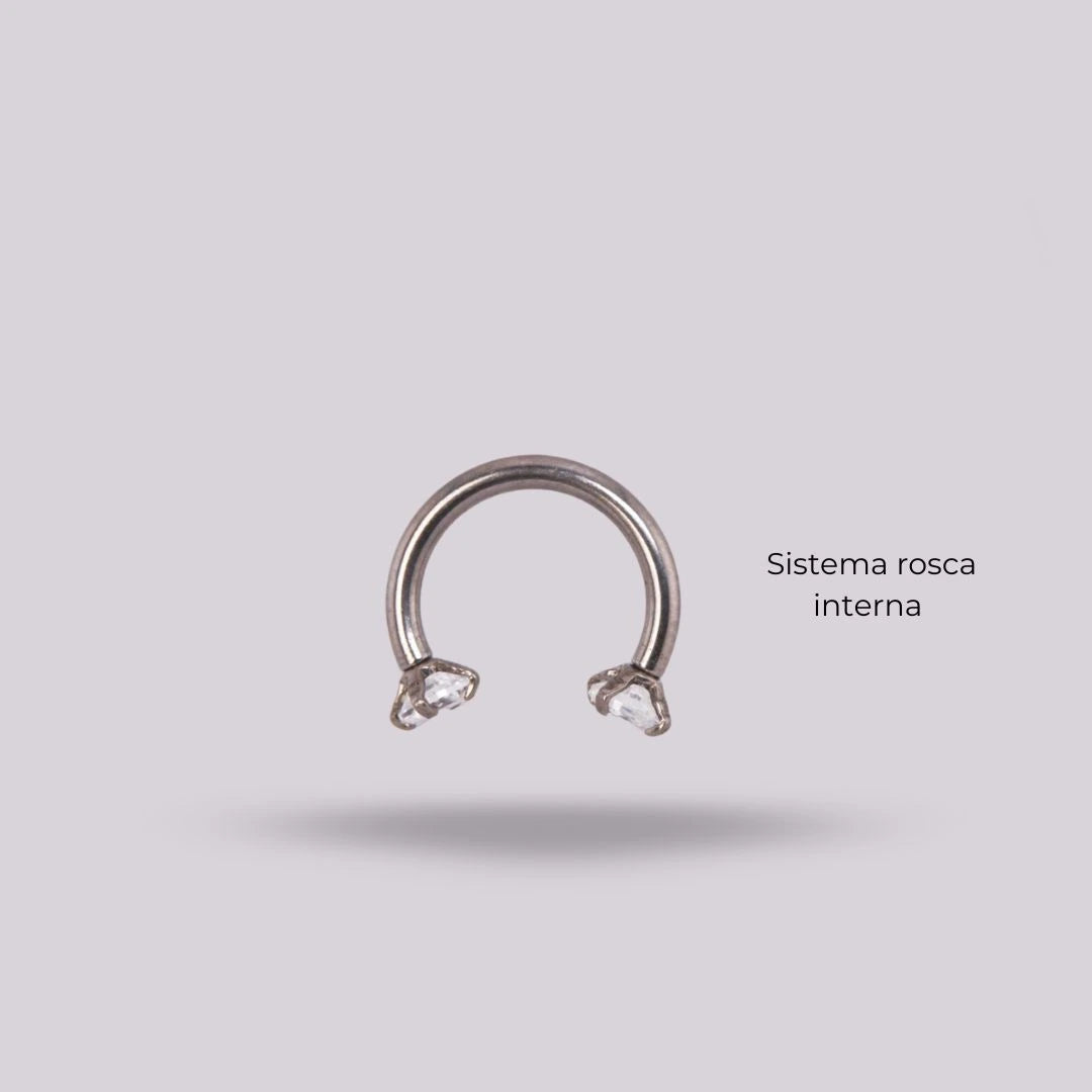 Joya herradura zircon