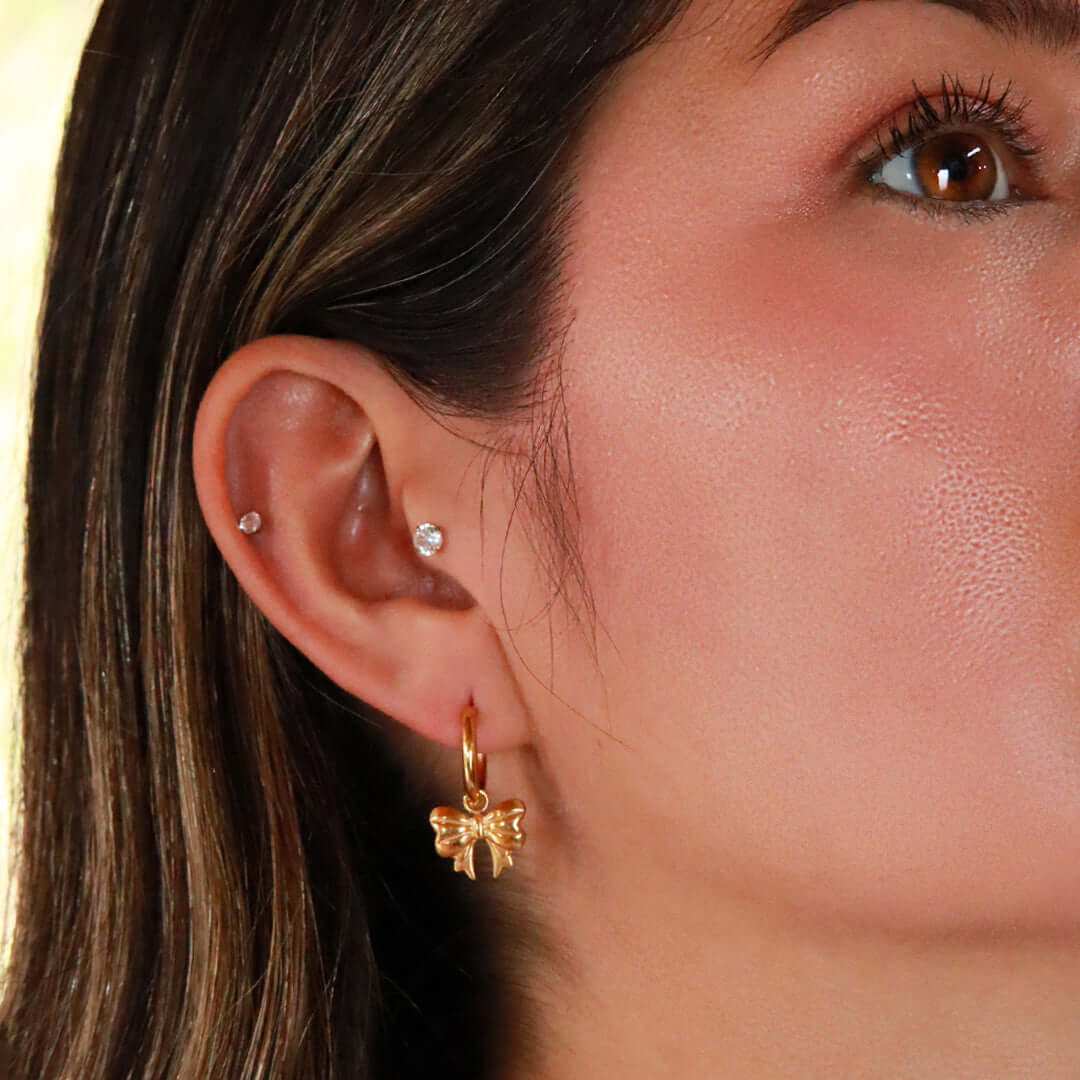 Pendientes Tipo Candonga con Moños Delicados - Acero Inoxidable Dorado y Plateado - Helix Body Jewelry - Tienda Online de Piercings