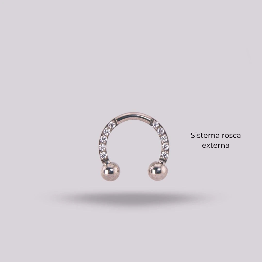 Joya herradura zircon