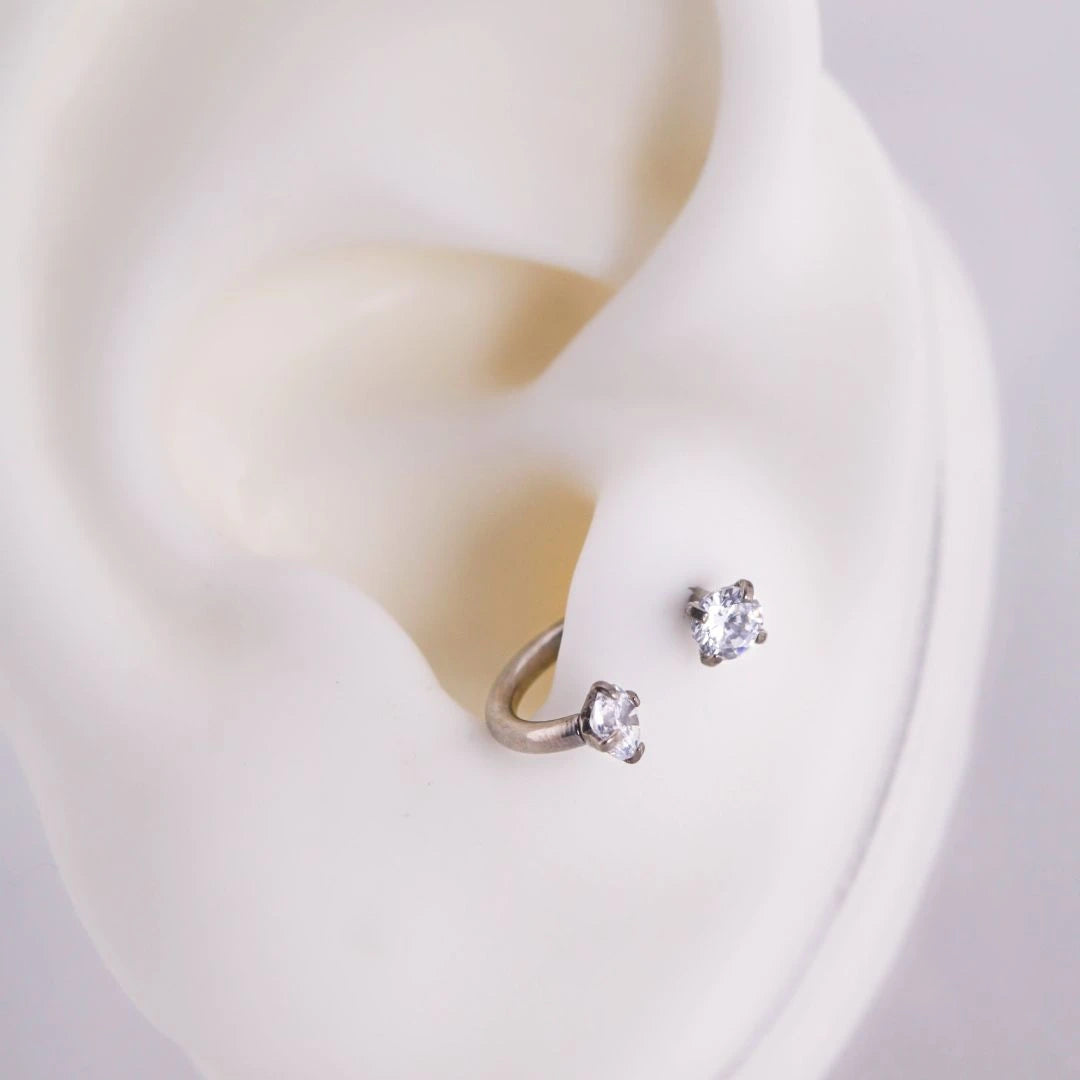 Joya herradura zircon