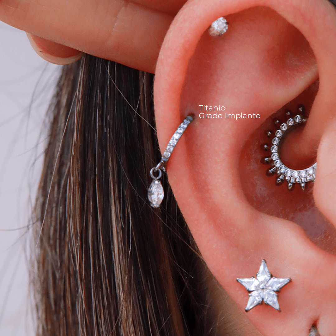 Aro en Titanio con pendiente dorado y plateado - Helix Body Jewelry - Tienda Online de Piercings