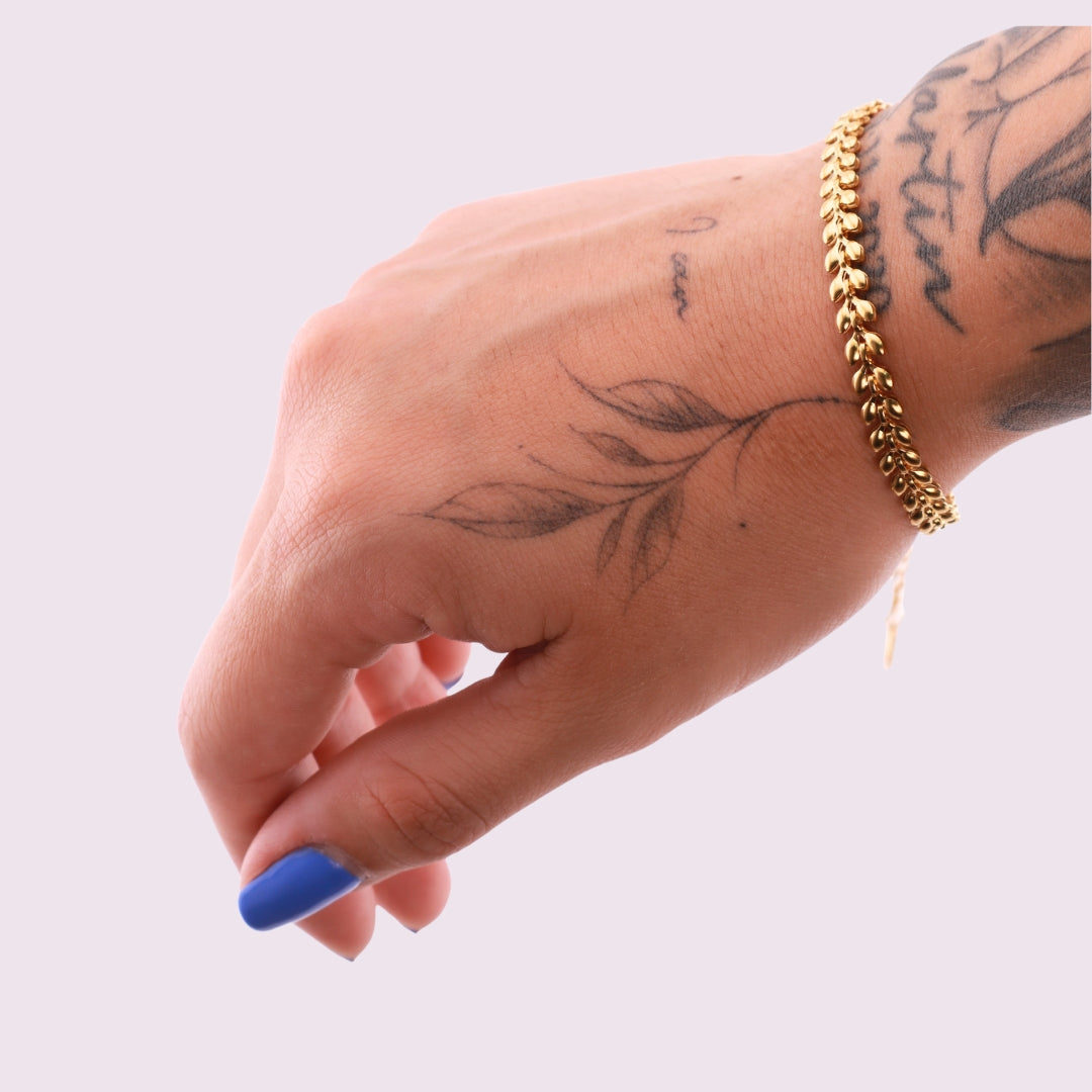 Pulsera pétalos dorada en acero inoxidable | Helix Body Jewelry